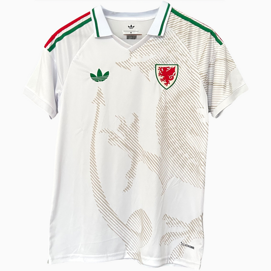 Wales Away Kit 2026 by ELVN featuring the team's blue jersey with red and white accents, displayed on a plain background.