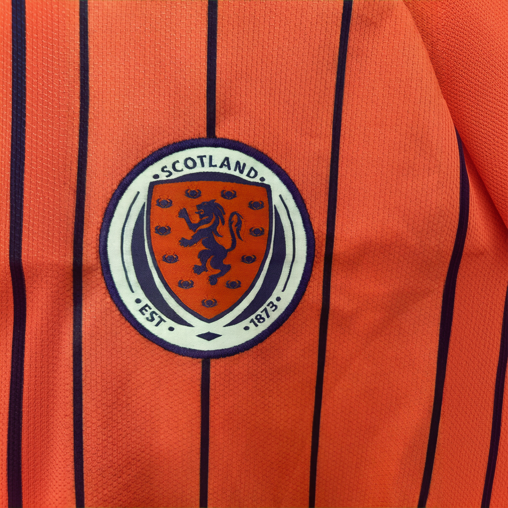 Scotland away soccer kit 2026 by ELVN, featuring blue jersey with Scotland crest and matching shorts on a mannequin.
