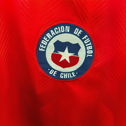 Elvn Chile Home Kit 2026 soccer jersey with team logo and vibrant red and white design, displayed on a flat surface.
