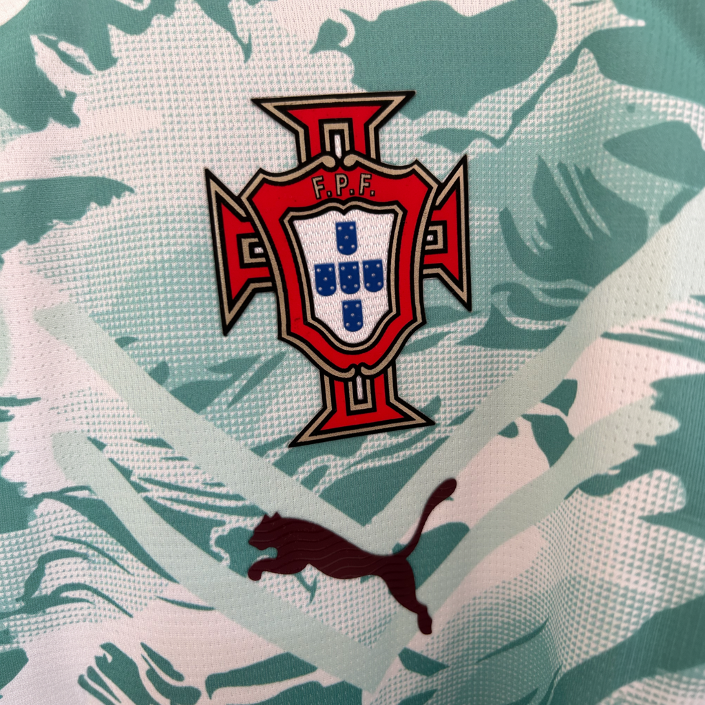 Portugal away soccer kit 2026 by ELVN, featuring the team’s away uniform with red and green accents and team logo.