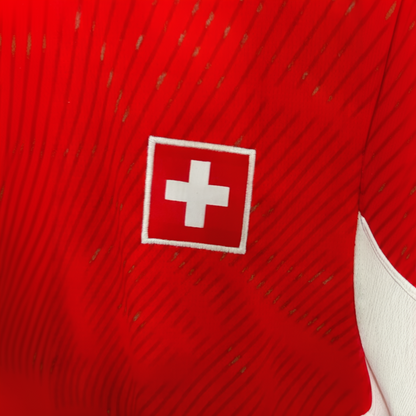 Switzerland home football kit 2026 by ELVN, featuring the team jersey with red and white design and team logo on the front.