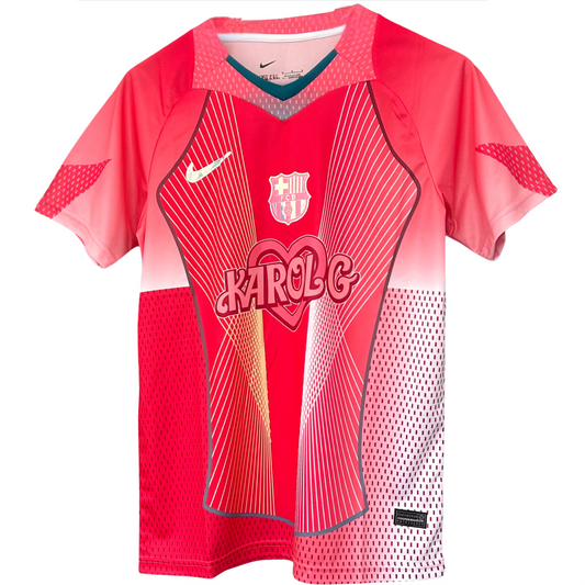 FC Barcelona x Karol G kit by ELVN featuring vibrant team and artist graphics on a stylish sportswear ensemble.