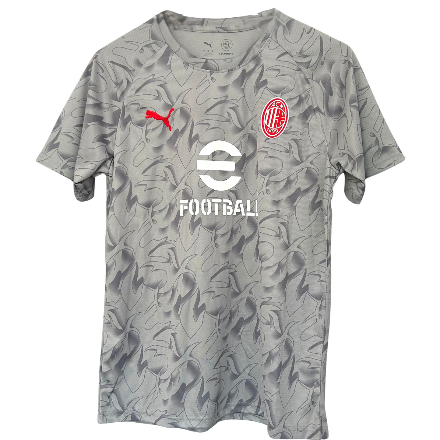 AC Milan pre-match kit 2025/26 by ELVN, featuring the team jersey and shorts with club crest and design details.