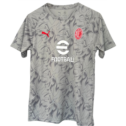 AC Milan pre-match kit 2025/26 by ELVN, featuring the team jersey and shorts with club crest and design details.