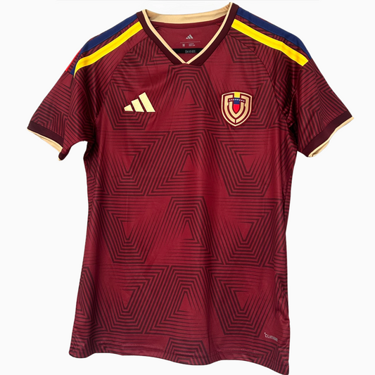 VENEZUELA home soccer kit 2026 by ELVN, featuring the team's jersey with national colors and logo displayed.
