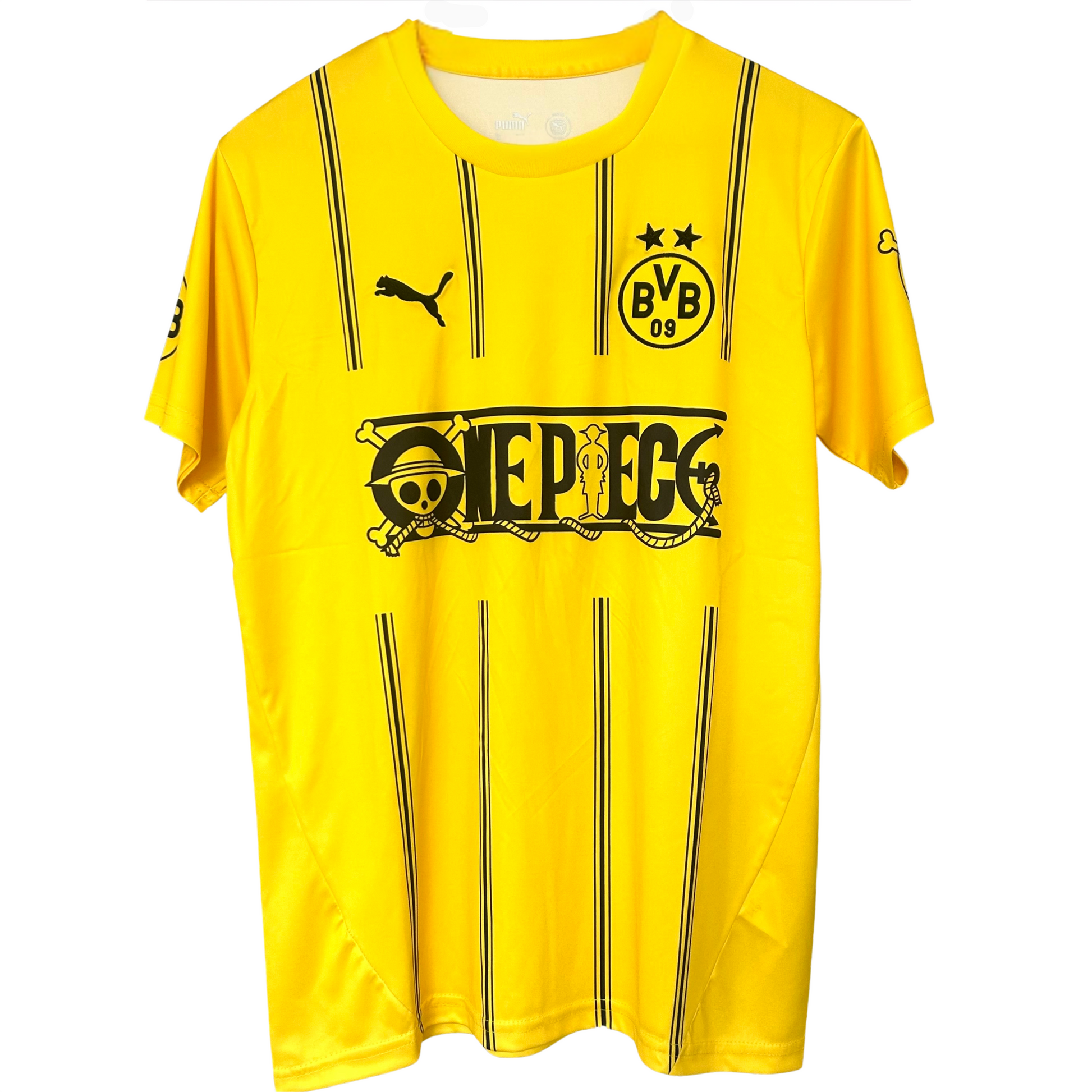 Elvn Borussia Dortmund X One Piece kit featuring team jersey with logo and colorful design, displayed on a flat surface.