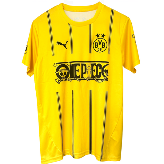 Elvn Borussia Dortmund X One Piece kit featuring team jersey with logo and colorful design, displayed on a flat surface.