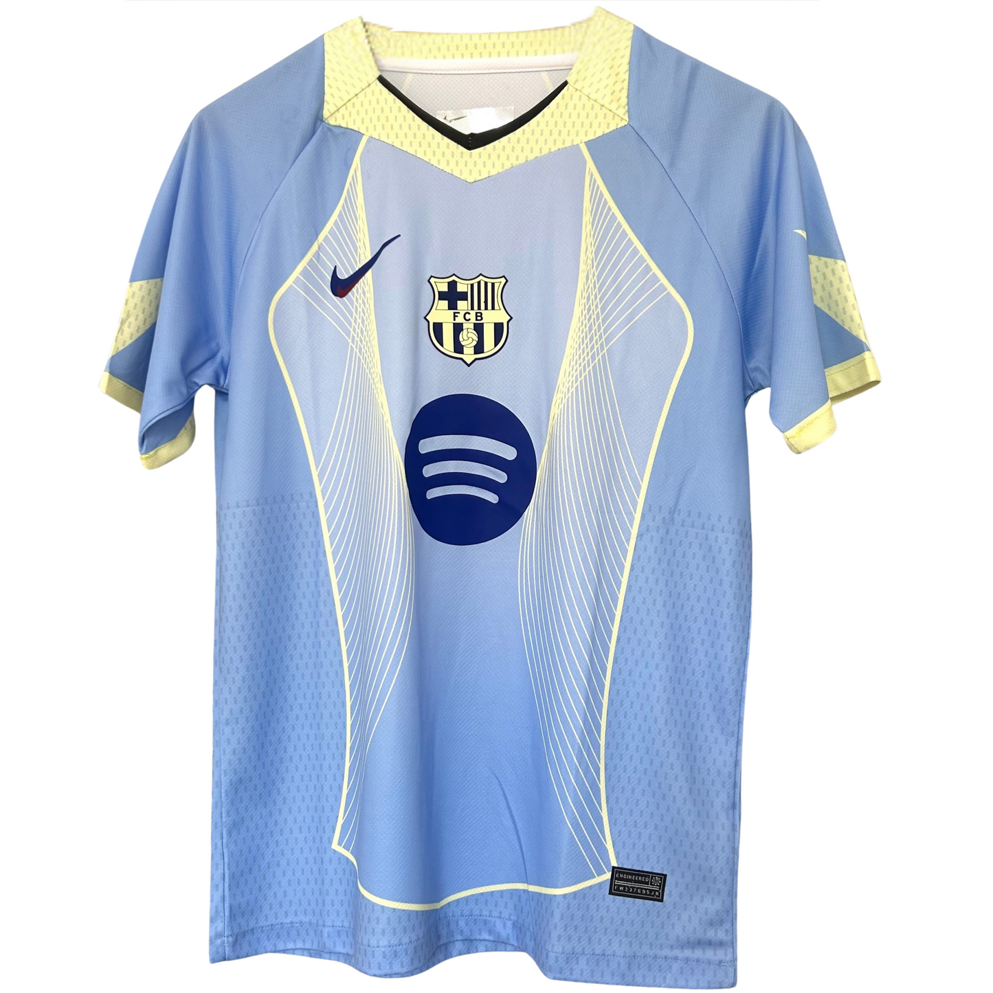 FC Barcelona light blue football kit by ELVN, featuring team crest and athletic design, worn by players on the field.