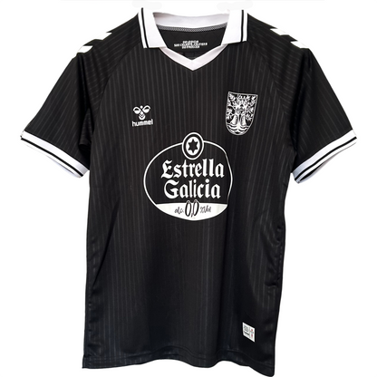 Elvn Celta de Vigo 100th Anniversary kit in black, featuring team jersey with logo and matching shorts, displayed on a plain background.